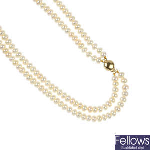 A cultured pearl double-strand necklace.