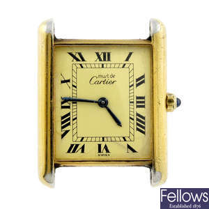 CARTIER - a gold plated silver Must De Cartier watch head.