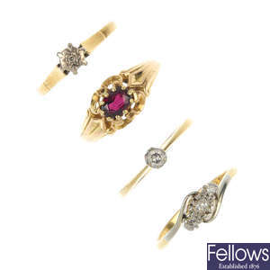 A selection of four 18ct gold gem-set and diamond rings. 