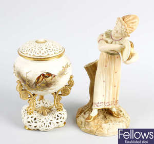 A Grainger & Co. Worcester porcelain reticulated pot and cover, plus a figure by James Hadley