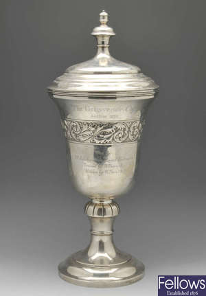 A 1930's silver trophy cup and cover.