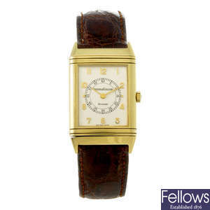 JAEGER-LECOULTRE - a gentleman's 18ct yellow gold Reverso Classic wrist watch.