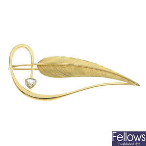 An 18ct gold diamond feather brooch.
