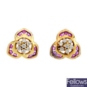 A pair of ruby and diamond ear-studs.