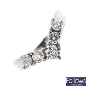 A diamond wishbone ring.