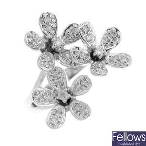 A 9ct gold diamond floral ring.