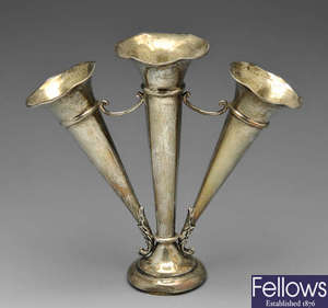 An early twentieth century silver bud vase, etc.