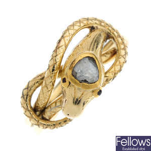 A diamond and gem-set snake ring.
