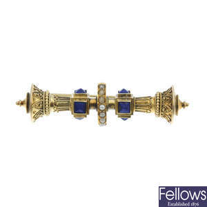 A late 19th century gold lapis lazuli and split pearl bar brooch.