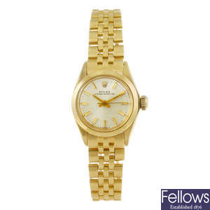 ROLEX - a lady's yellow metal Oyster Perpetual bracelet watch.