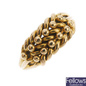 An Edwardian 18ct gold woven ring.