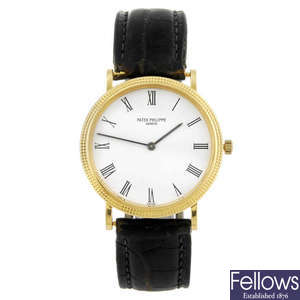 PATEK PHILIPPE - a gentleman's 18ct yellow gold Calatrava wrist watch.