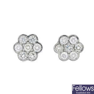 A pair of diamond cluster ear studs.