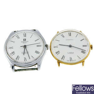 A pair of gentleman's manual wind watch heads.