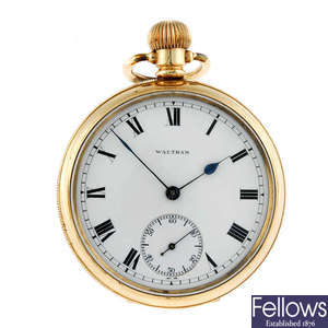 A gold plated open face pocket watch by Waltham.