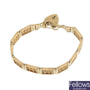 A 9ct gold fancy-link gate bracelet.