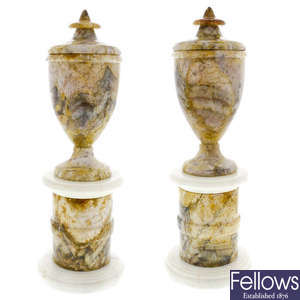A pair of Derbyshire fluorspar pedestal urns