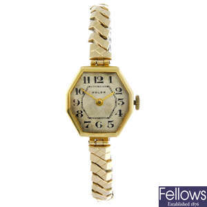 ROLEX - a lady's 18ct yellow gold bracelet watch.