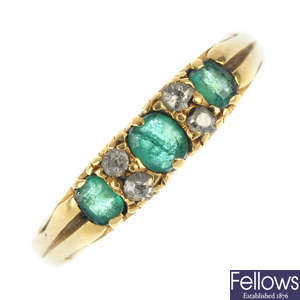 An early 20th century 18ct gold emerald and diamond ring.