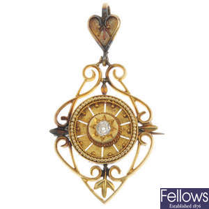 An early 20th century 16ct gold diamond pendant. 