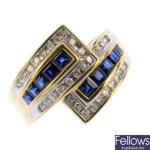 A sapphire and diamond crossover dress ring.