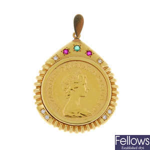 A diamond and gem-set mounted full sovereign pendant.
