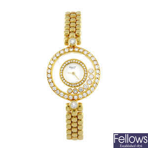CHOPARD - a lady's 18ct yellow gold Happy Diamonds bracelet watch.
