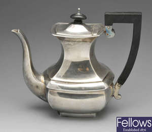 An early twentieth century silver coffee pot. 