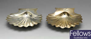 A pair of George III silver butter shells.