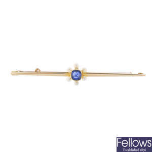An 18ct gold sapphire and seed pearl bar brooch.