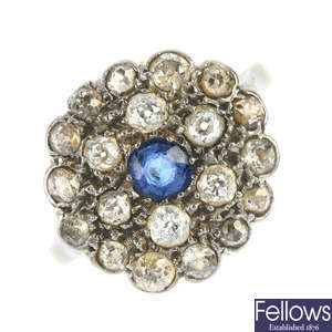 A diamond and sapphire dress ring. 