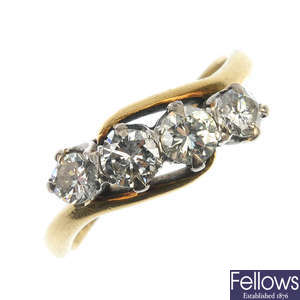 A mid 20th century 18ct gold diamond four-stone ring. 