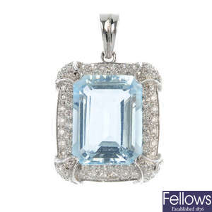 An aquamarine and diamond cluster pendant. 