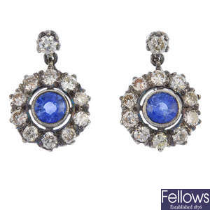 A pair of sapphire and diamond ear pendants.