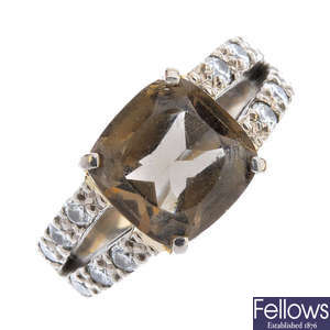 A smoky quartz and diamond dress ring.