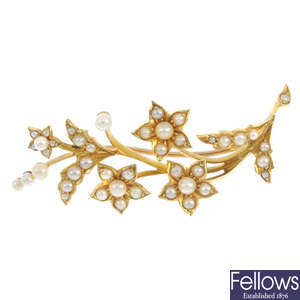 An early 20th century 15ct gold split-pearl and cultured pearl brooch.