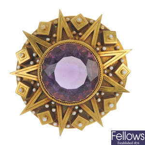 A late Victorian gold amethyst and enamel brooch.