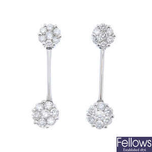 A pair of 18ct gold diamond cluster ear pendants.