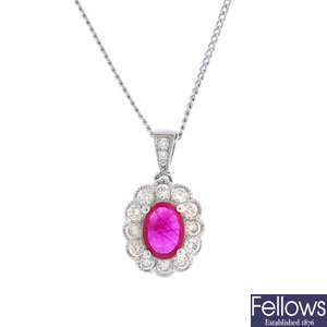 An 18ct gold ruby and diamond pendant.