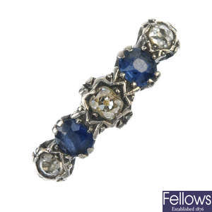 An early 20th century platinum and 18ct gold sapphire and diamond ring.