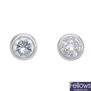 A pair of 18ct gold brilliant-cut diamond collet ear studs. 