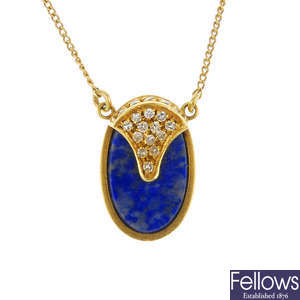A 1970s 18ct gold diamond and lapis lazuli pendant.