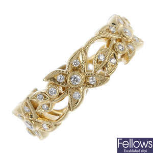 An 18ct gold diamond floral full-circle eternity ring.