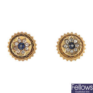 A pair of sapphire and diamond ear studs.