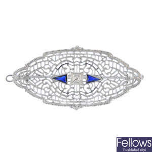 A diamond and synthetic sapphire brooch. 