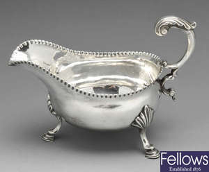 A George III silver sauce boat by Hester Bateman.
