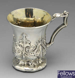 An early Victorian silver mug in Gothic style.