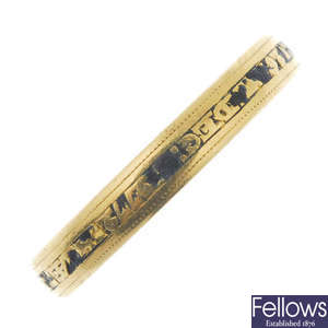 A late 19th century gold enamel memorial band ring.