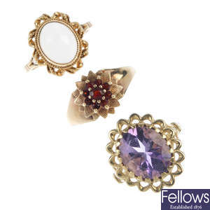A selection of three 9ct gold gem-set dress rings.