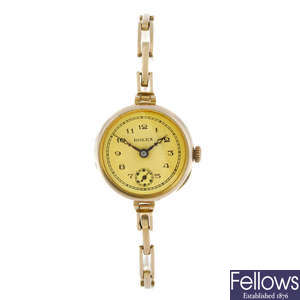 ROLEX - a lady's rose metal bracelet watch.